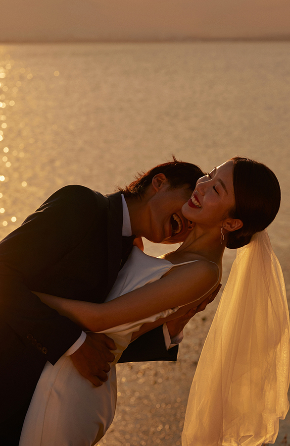 秦先生&范小姐夫妇深圳海景夕阳婚纱照