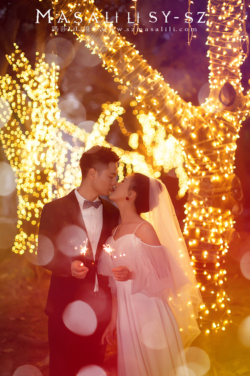 吴小姐夫妇浪漫海景古装婚纱照                       深圳婚纱摄影工作室